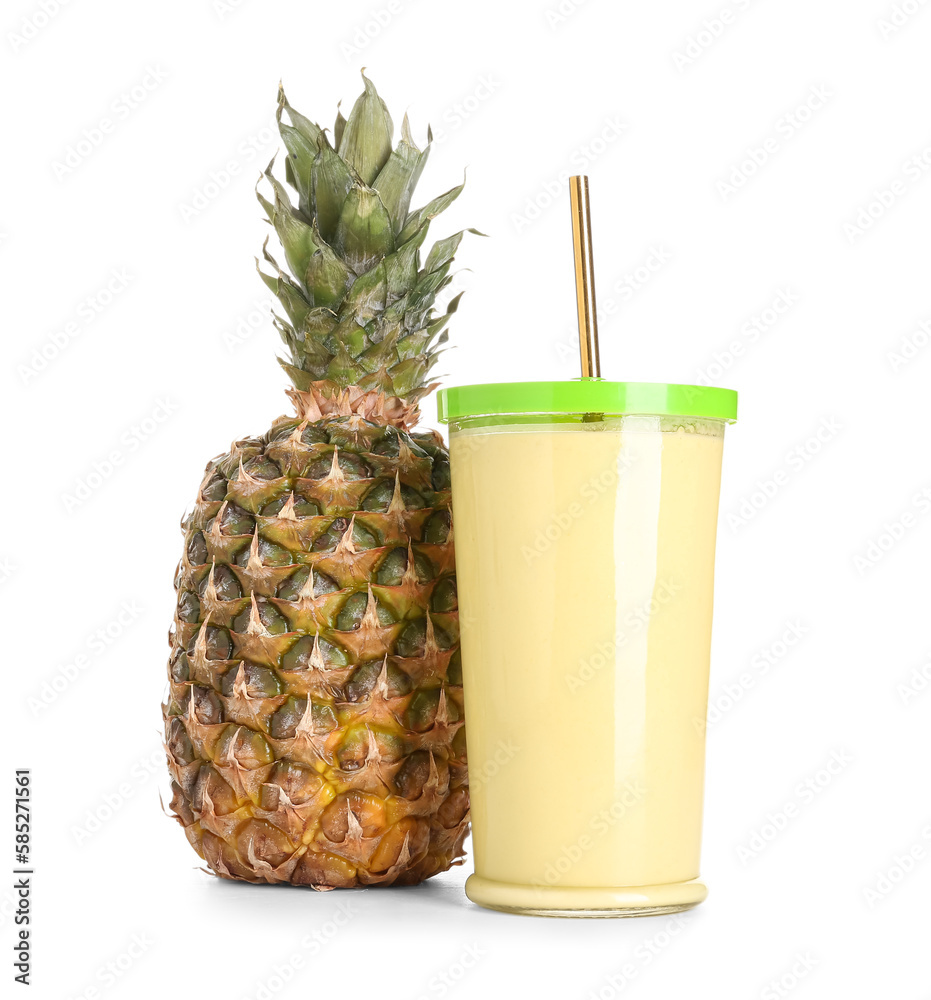 Glass of tasty smoothie with pineapple and straw on white background