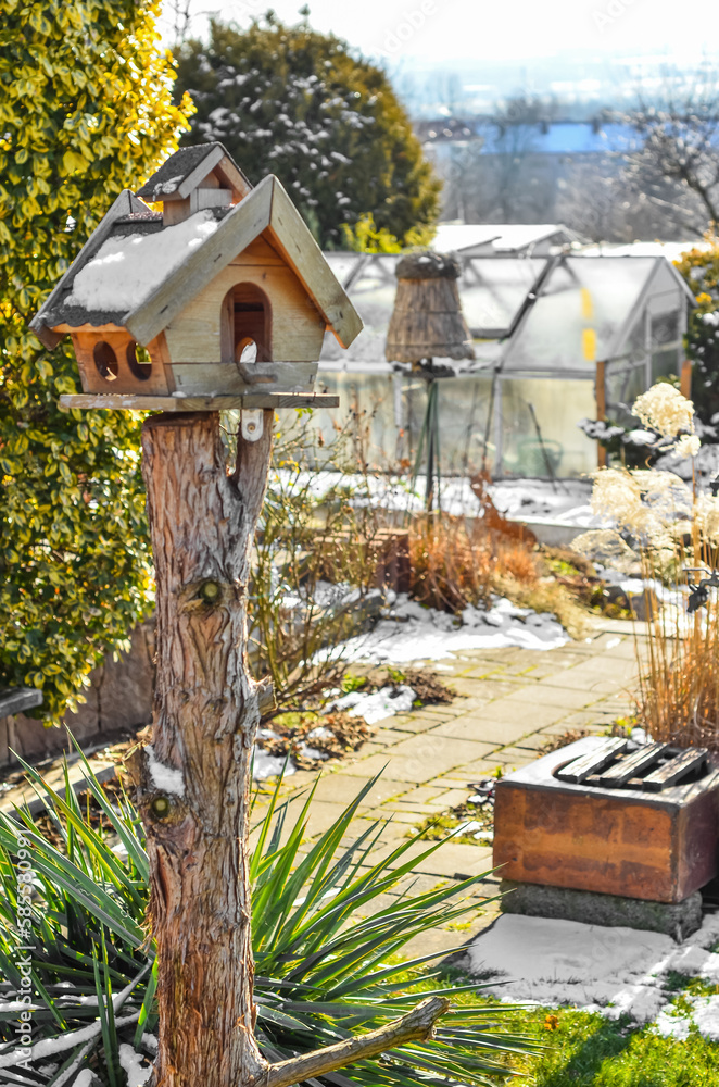 View of wooden bird house in village