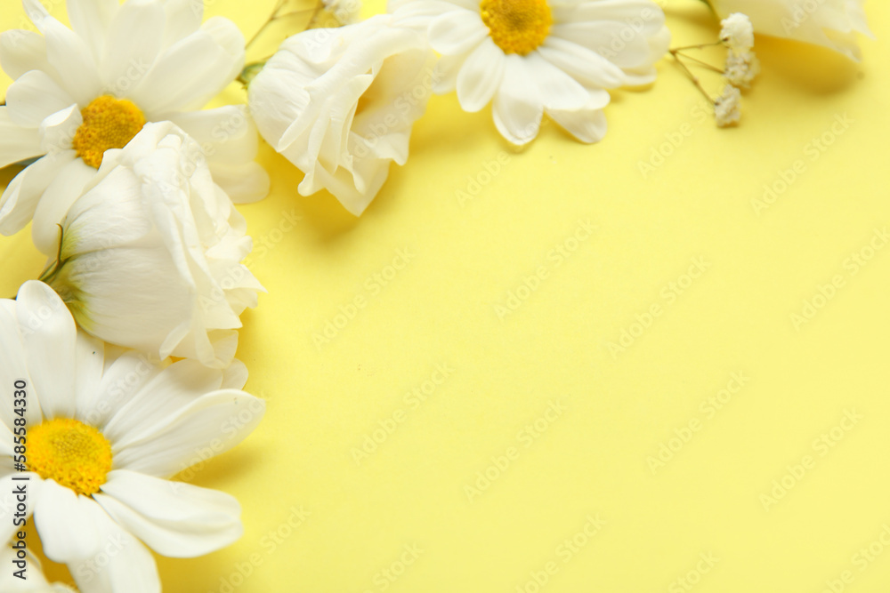 Beautiful eustoma and chamomile flowers on yellow background, closeup