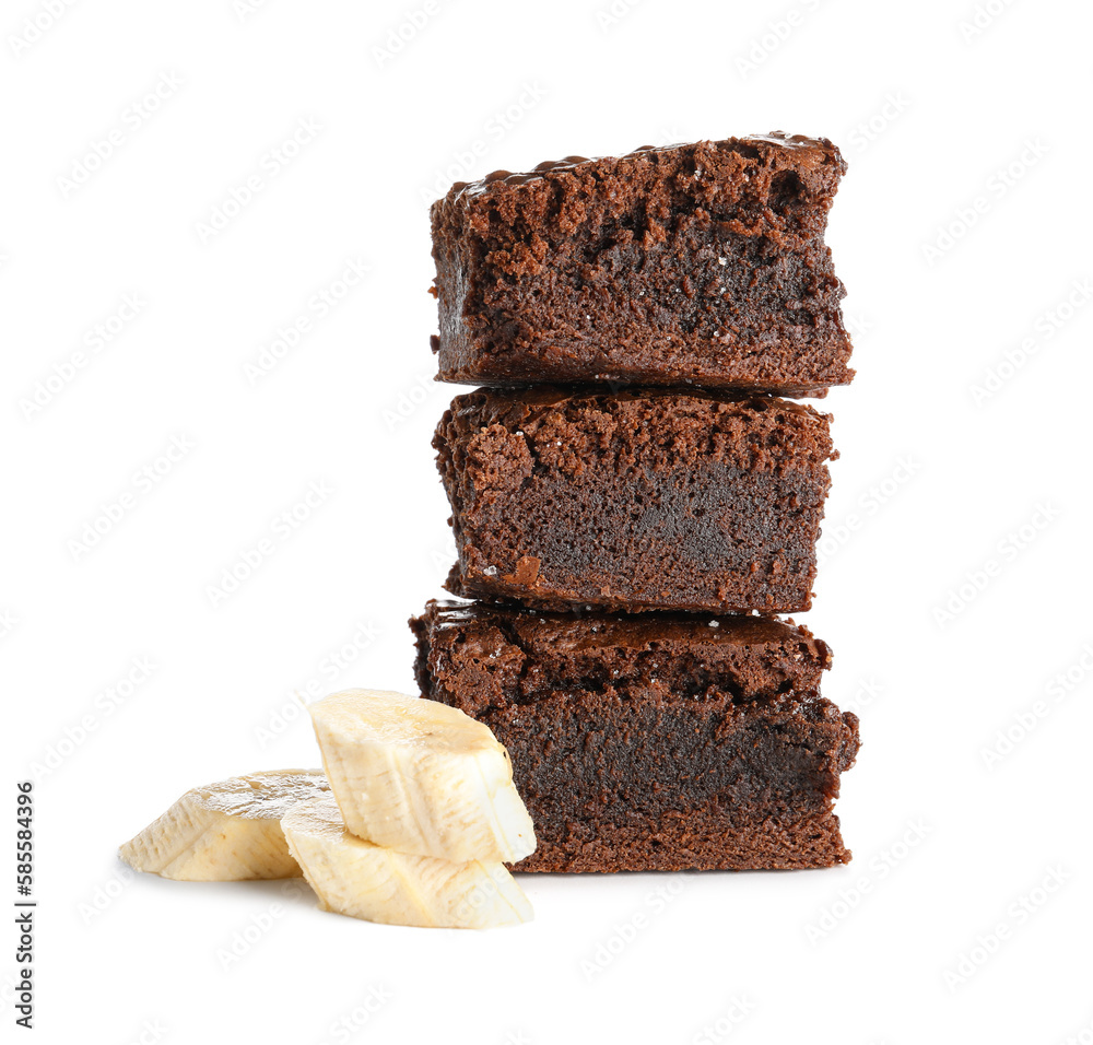 Pieces of tasty chocolate brownie with banana isolated on white background