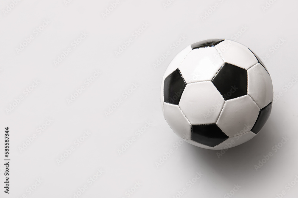 Soccer ball on light background