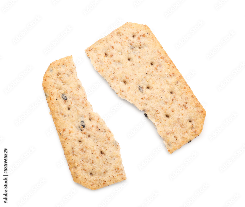 Halves of tasty cracker isolated on white background