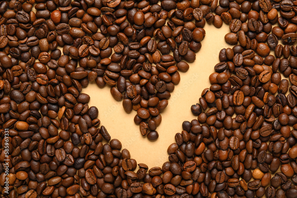 Check mark made of coffee beans on beige background