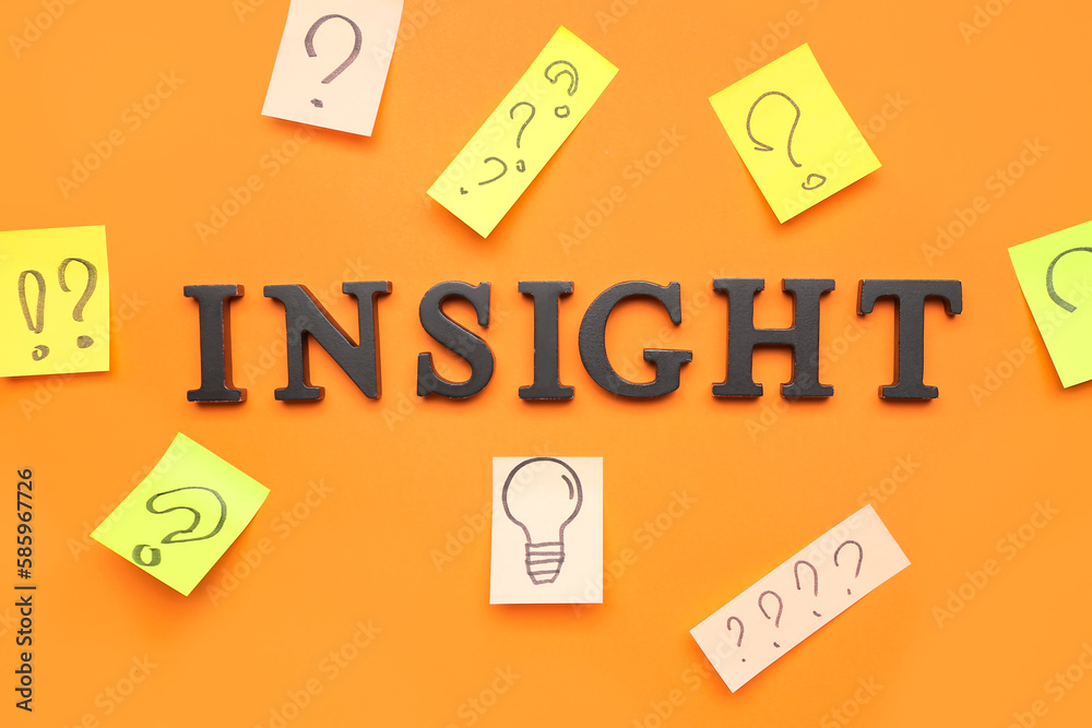 Word INSIGHT, papers with drawn question marks and light bulb on red background