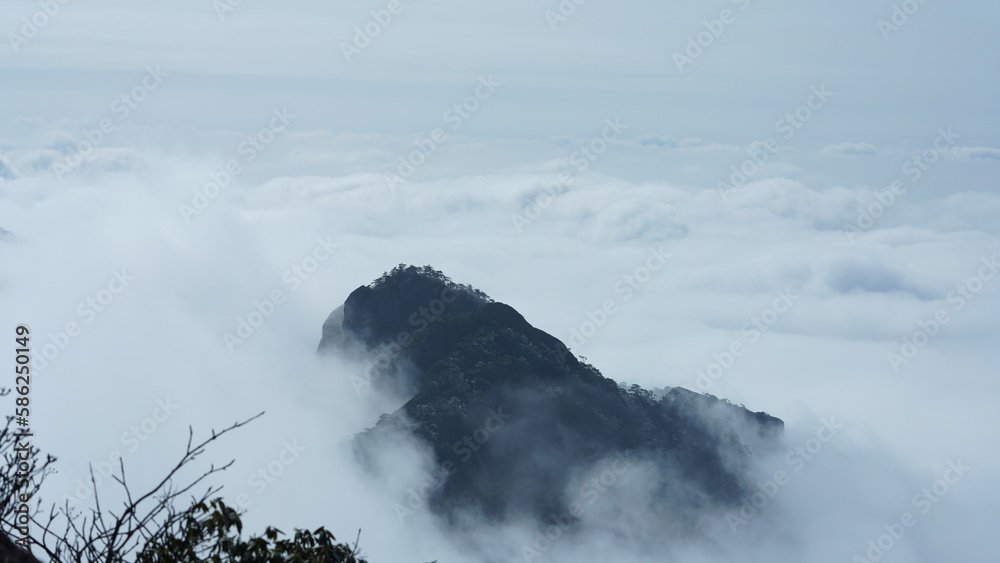 The beautiful mountains landscapes with the green forest and the erupted rock cliff as background in