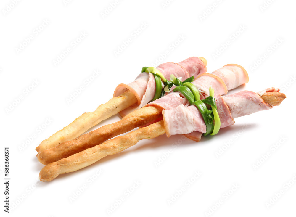 Tasty Italian Grissini with bacon on white background