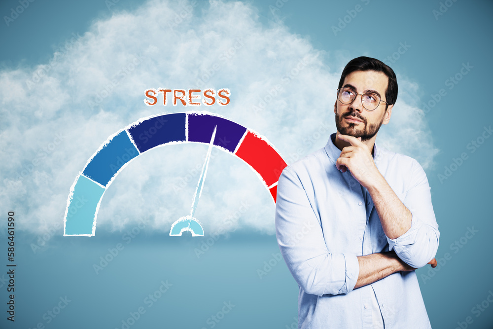 Attractive young busiess man with rising stress level scale on abstract blue background with cloud. 