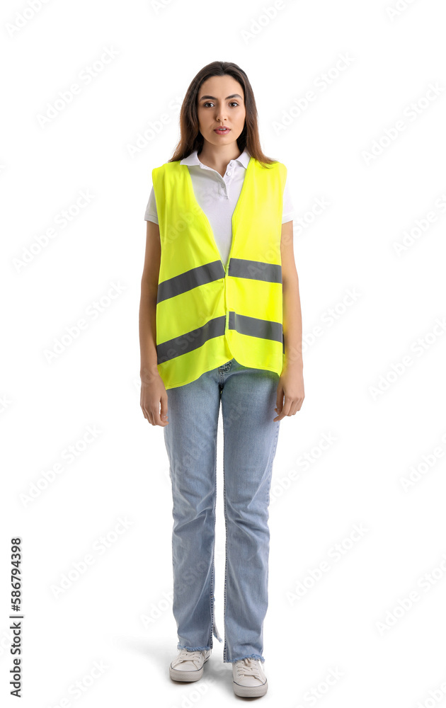 Female worker in vest on white background