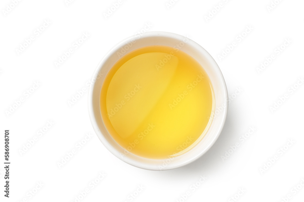 Top view of cooking oil in white bowl isolated on white background. Clipiing path.