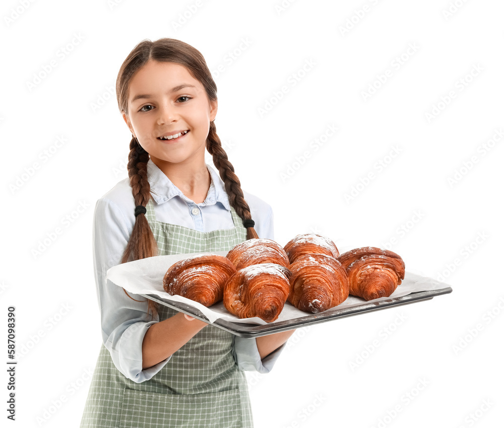 Little baker with tray of tasty croissants on white background