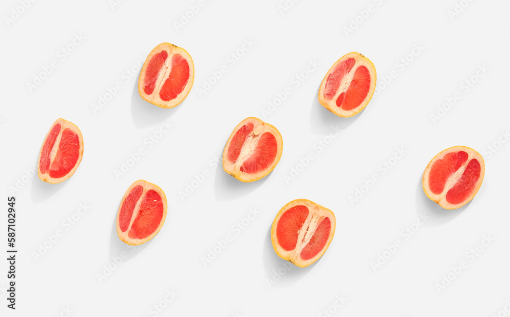 Pieces of ripe grapefruit isolated on white background