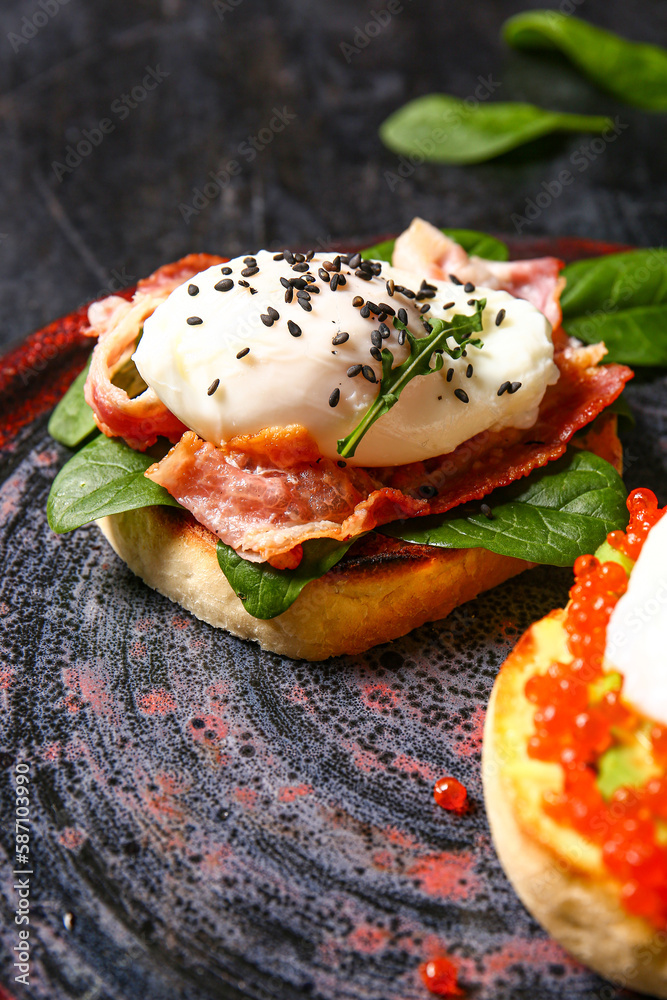 Plate with delicious egg Benedict, closeup