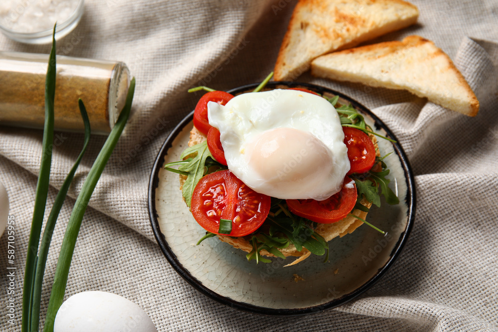 Plate with tasty egg Benedict on table