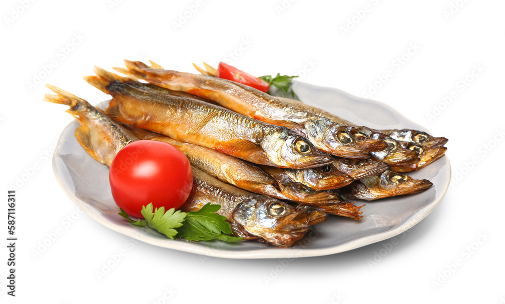 Plate with delicious smoked capelin, tomatoes and parsley isolated on white background