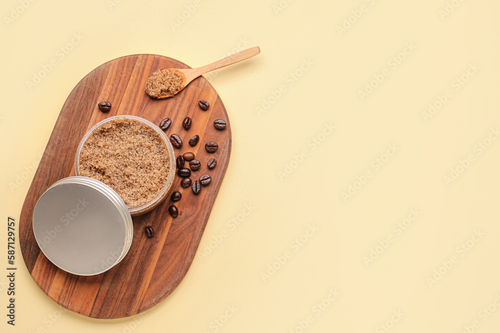 Wooden board with jar of body scrub and coffee beans on color background