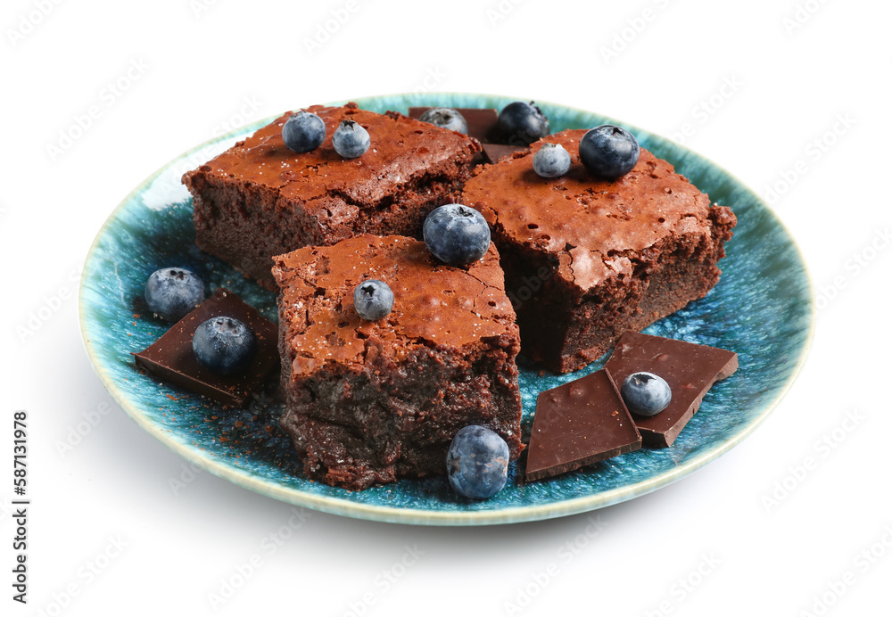 Plate with pieces of tasty chocolate brownie isolated on white background