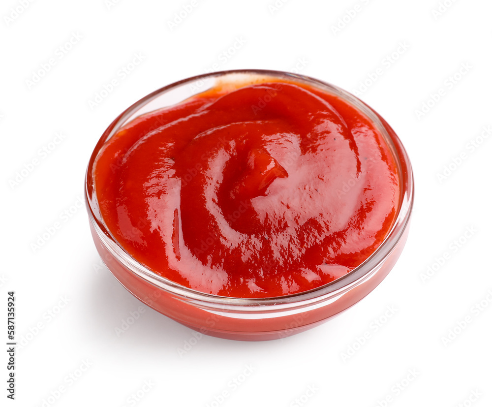 Bowl of tasty ketchup isolated on white background