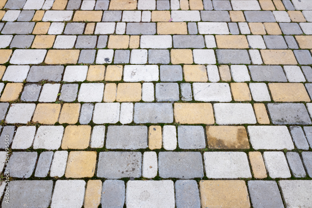 Sidewalk paving stones on the background of the sidewalk.