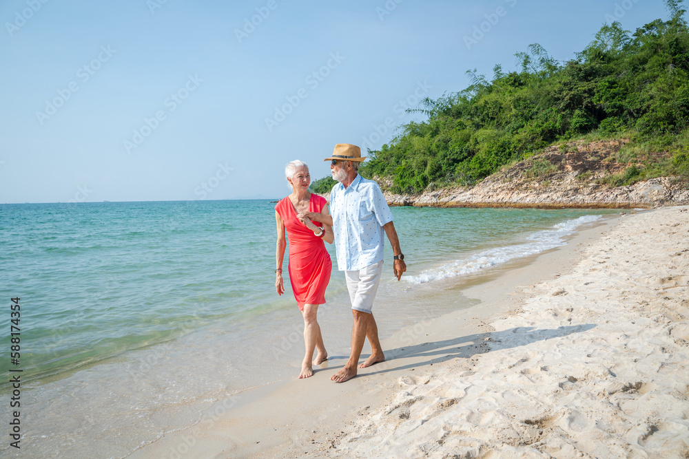 Mature couple have fun together on the beach, Lifestyle, Love and weekend.