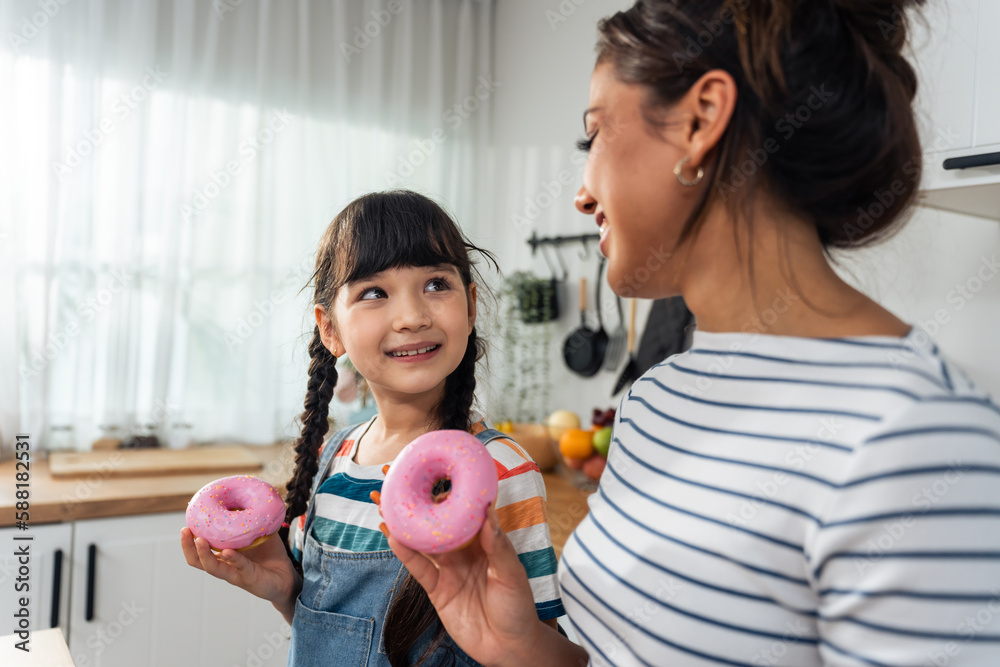 Caucasian happy family, parent spend time with kid together at home.