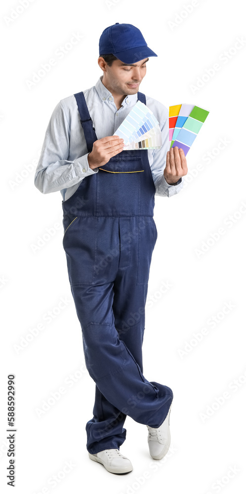 Male painter with color palettes on white background