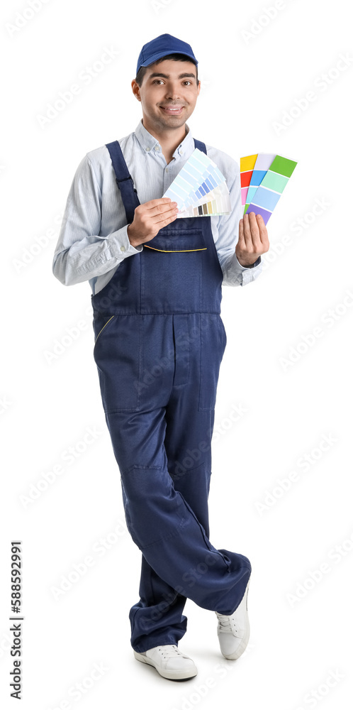 Male painter with color palettes on white background