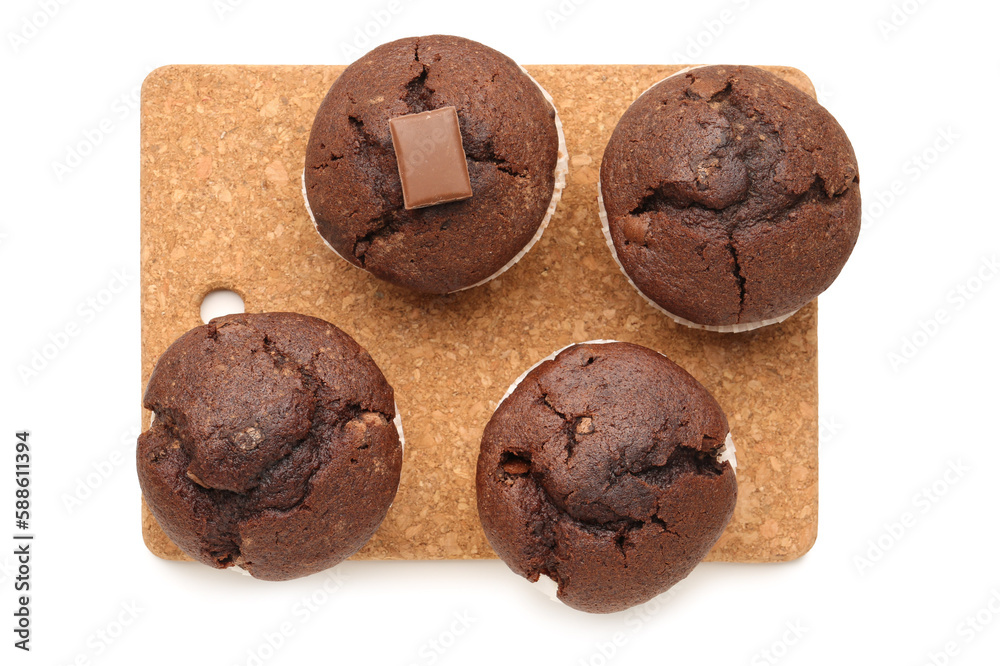 Board with tasty chocolate cupcakes isolated on white background