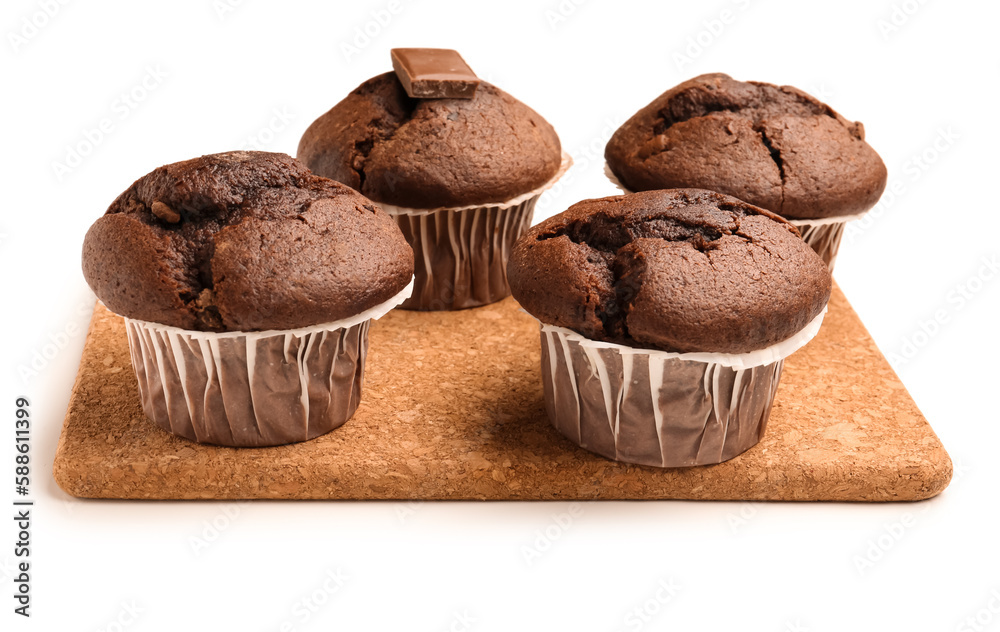 Board with tasty chocolate cupcakes isolated on white background