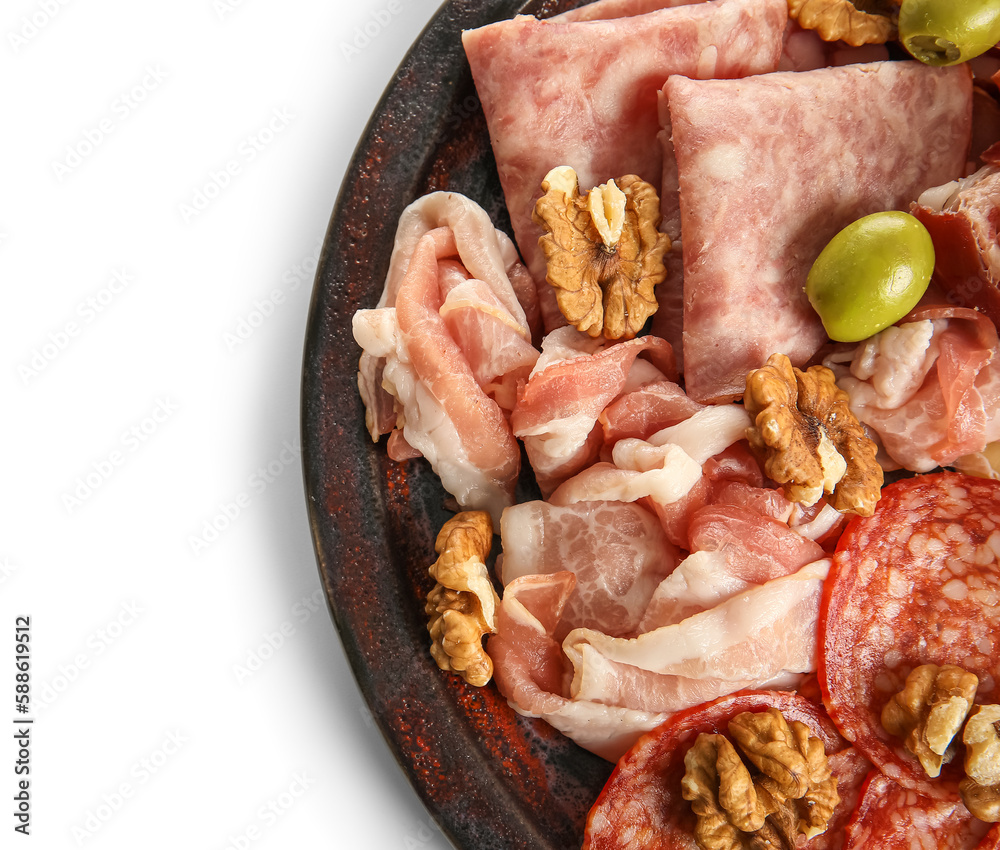 Plate with assortment of tasty deli meats isolated on white background, closeup