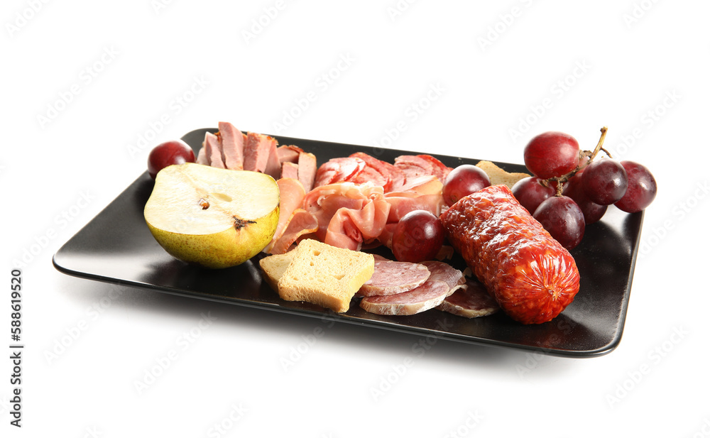 Plate with assortment of tasty deli meats isolated on white background