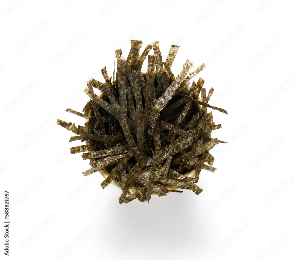 Bowl of cut nori sheets on white background