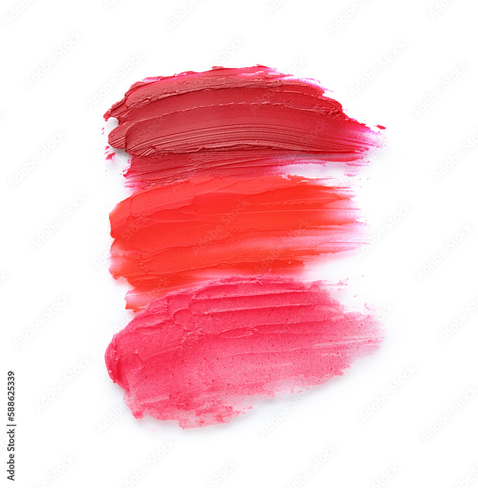 Different lipstick strokes on white background