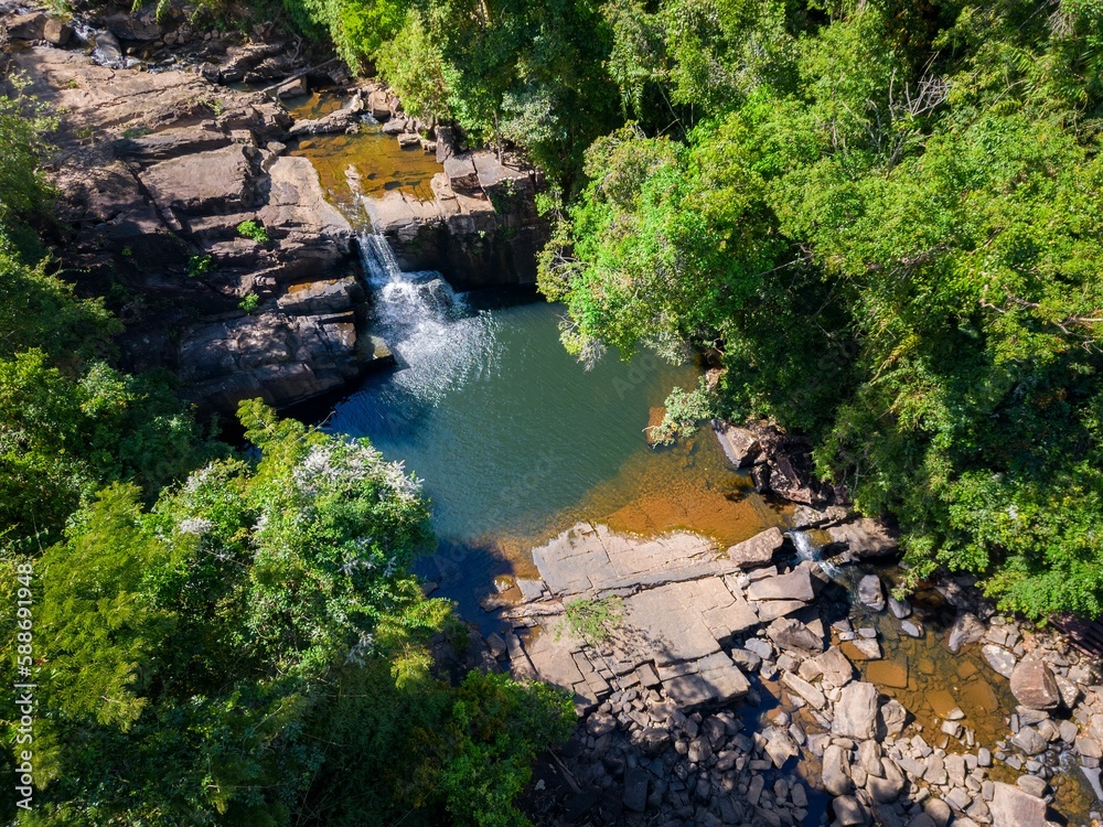 Aerial of the Khlong Yai Kee waterfall surrounded by the green trees on Koh Kood island in Thailand