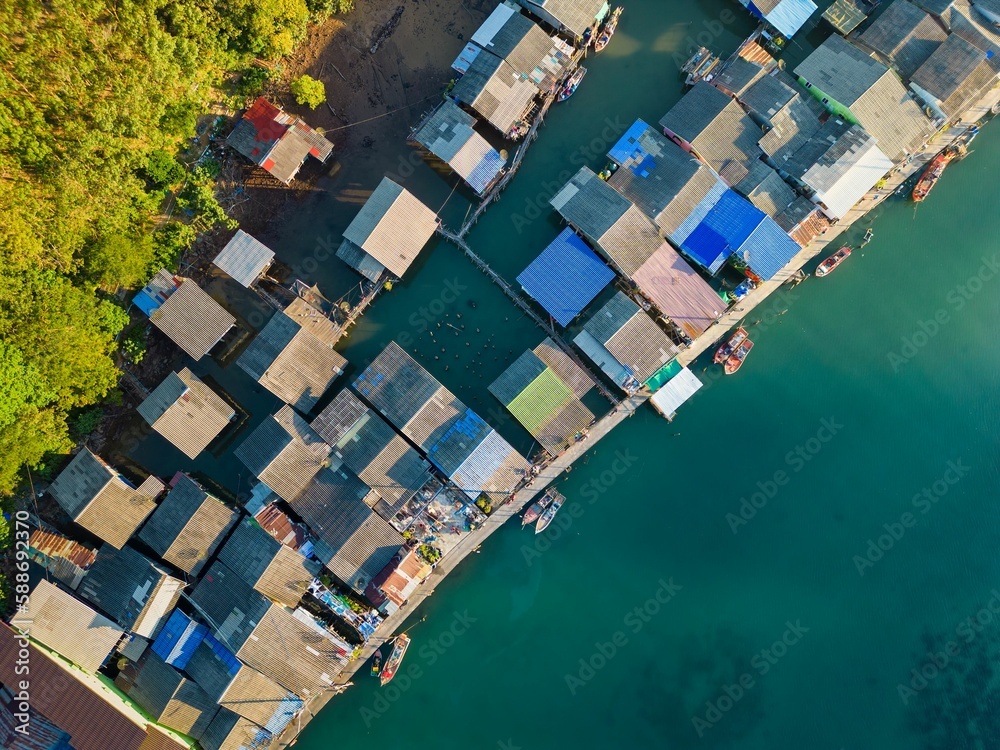 Top view of the Ao Salat floating fishing village on the sea in Thailand during the daytime