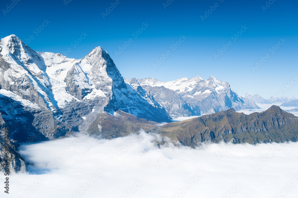 Mountain scenery in the Swiss Alps. Mountains peaks. Natural landscape. Mountain range and clear blu