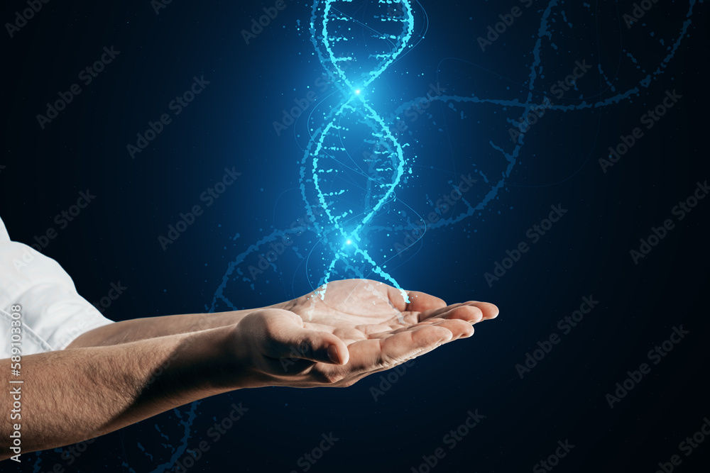 Close up of male hands holding glowing DNA helix hologram on dark background. Medicine and bioengine