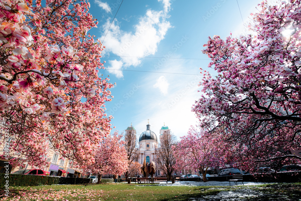 Scenic panoramic view of Makartplatz square in the old city center of salzburg with Dreifaltigkeitsk