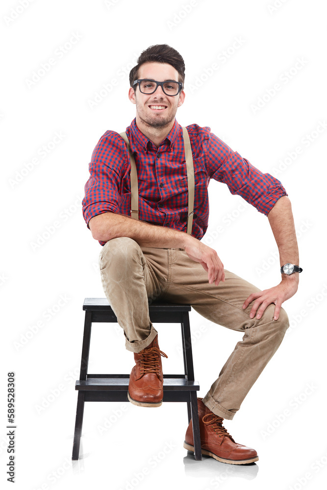 Nerdy man, smile for portrait while sitting on a chair and wearing hipster clothing with glasses. Ha