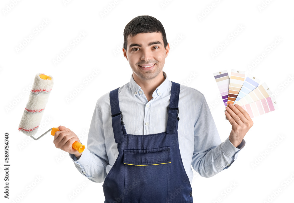 Male painter with color palettes and roller on white background