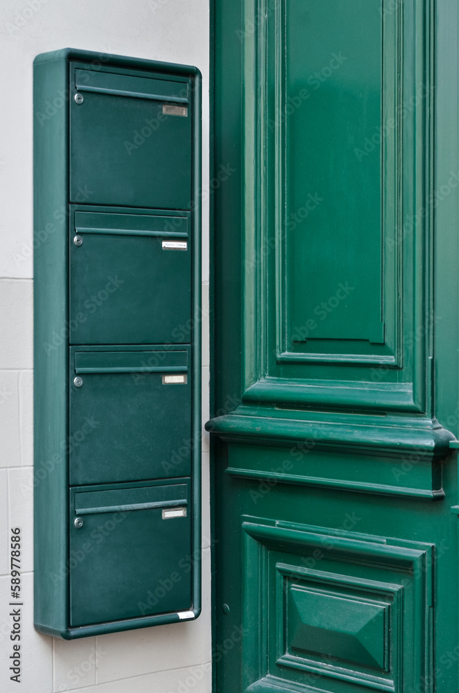 View of mailbox near door in city, closeup