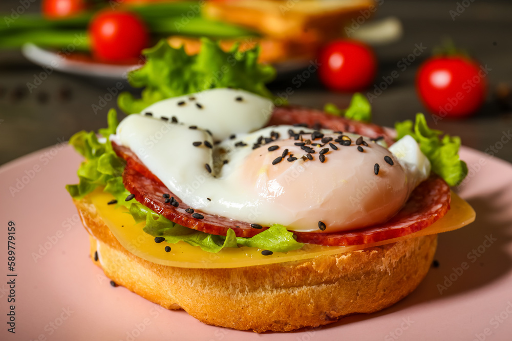 Plate with tasty egg Benedict on table, closeup