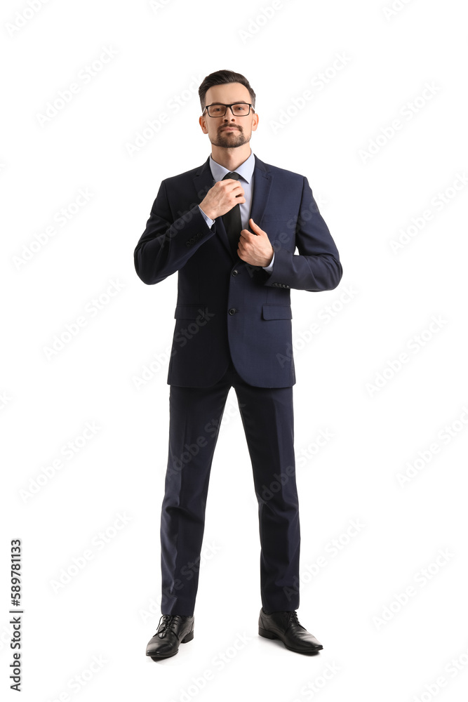 Handsome businessman in eyeglasses on white background