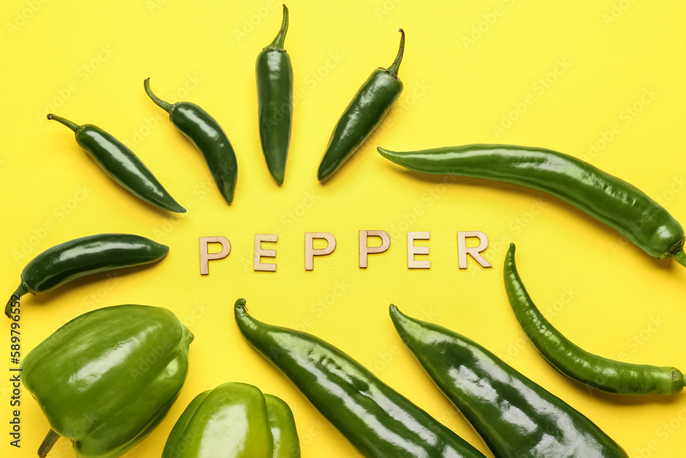 Word PEPPER and frame made of green peppers on yellow background