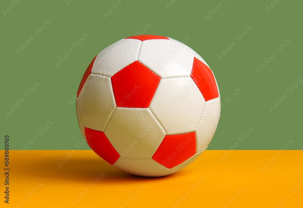 Soccer ball on color  background