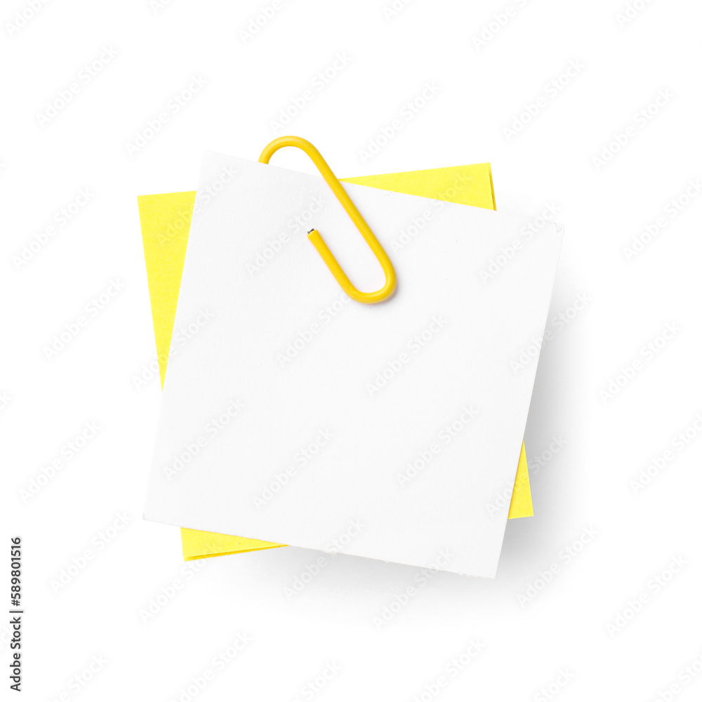 Colorful sticky notes with paper clip on white background