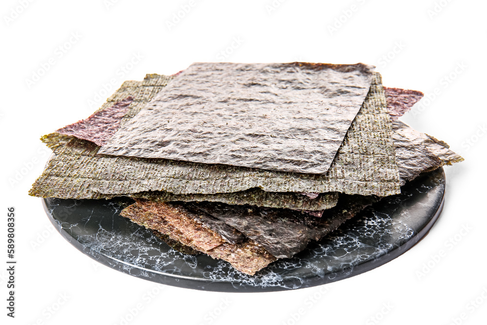 Slate board with natural nori sheets isolated on white background