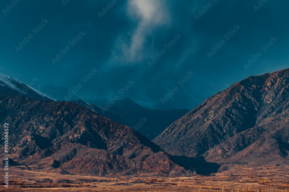 Mountain autumn landscape before the storm, Kyrgyzstan, dramatic colors