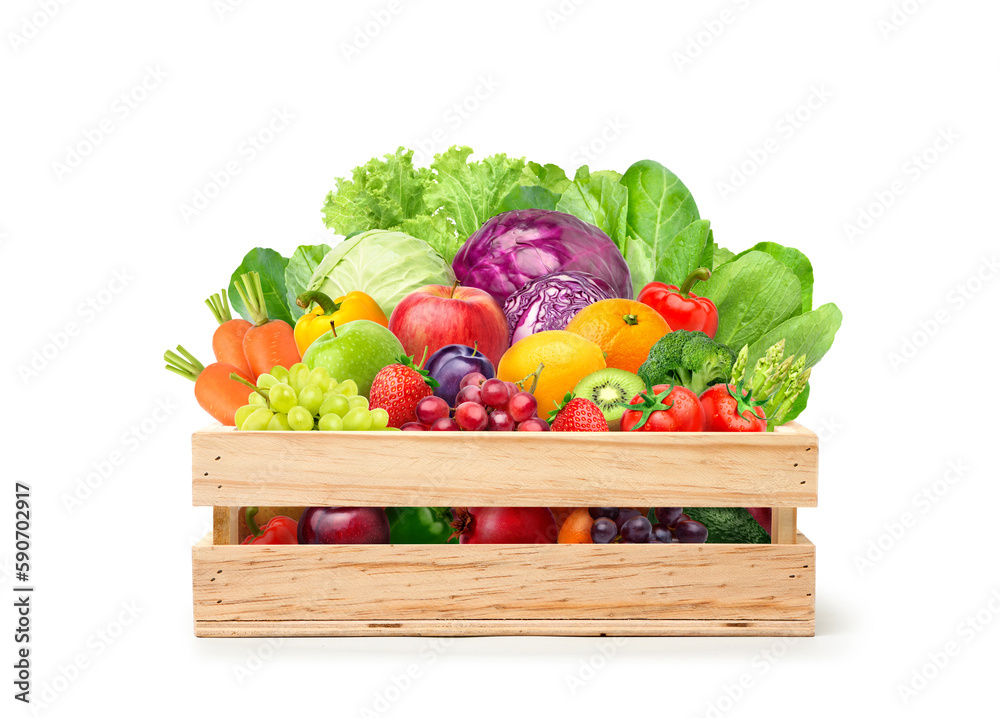 Variety of fruits and vegetable in wooden crate isolated on white background. Clipping path.