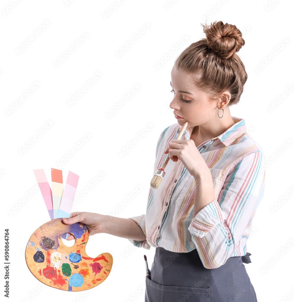 Thoughtful female artist with brush, color samples and paint palette on white background