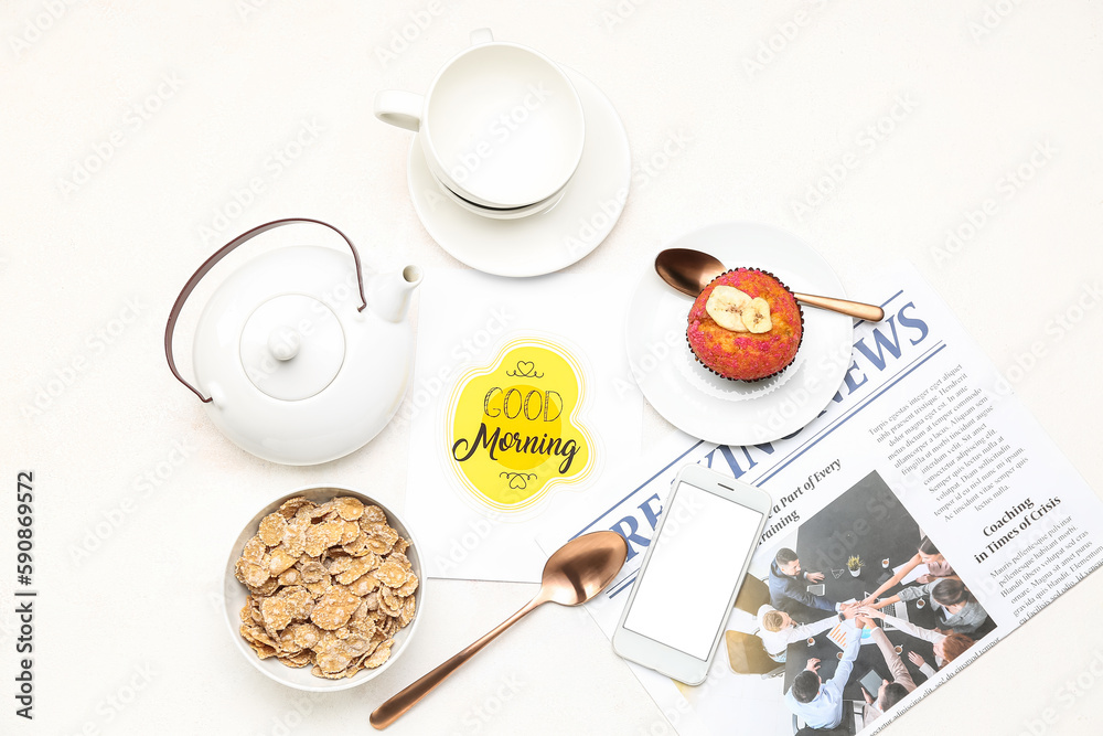 Composition with tea set, corn flakes, muffin, card and mobile phone on light background